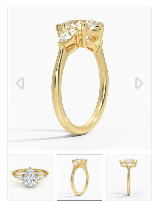 2.2 carat IGI certified lab diamond VS1 F pear. 0.2ctx2 side stones. Yellow gold 18K. Size 9