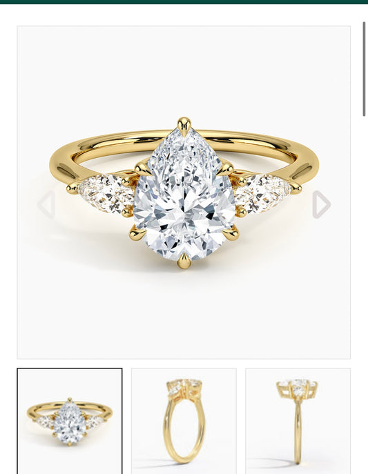 2.2 carat IGI certified lab diamond VS1 F pear. 0.2ctx2 side stones. Yellow gold 18K. Size 9