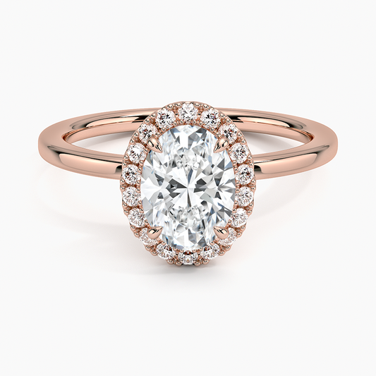 Oval halo engagement ring with 1 carat center diamond in rose gold setting