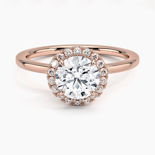 Rose gold halo engagement ring with 1 carat round lab-grown diamond center stone