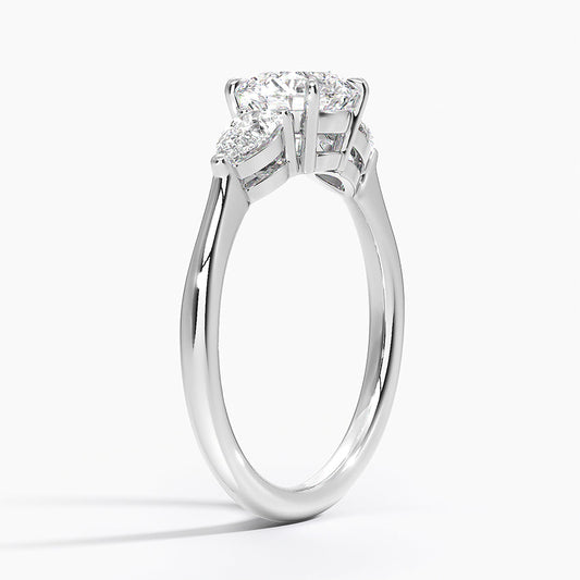 White gold three-stone lab-grown diamond engagement ring with round center stone