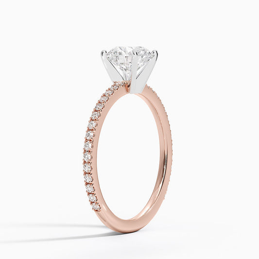 Rose gold pavé band engagement ring with a round lab-grown diamond solitaire