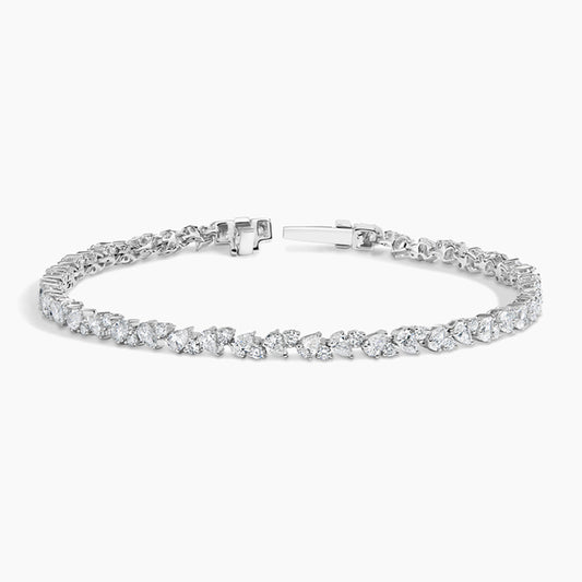 White gold tennis bracelet with round and pear-shaped lab-grown diamonds, elegant setting