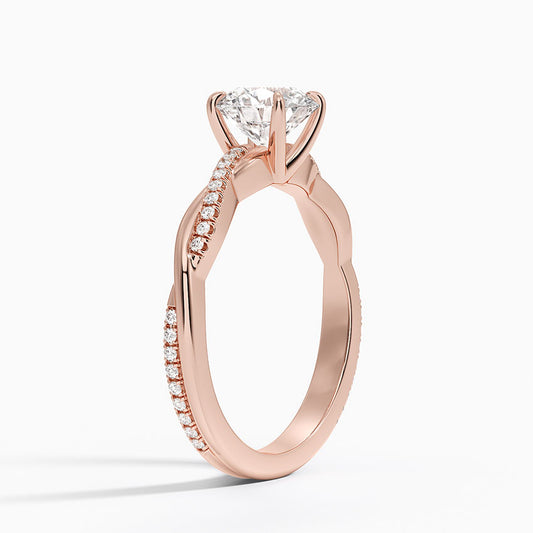Twisted rose gold engagement ring with 1ct round lab-grown diamond and pavé accents