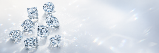 Diamonds glowing under UV light illustrating diamond fluorescence