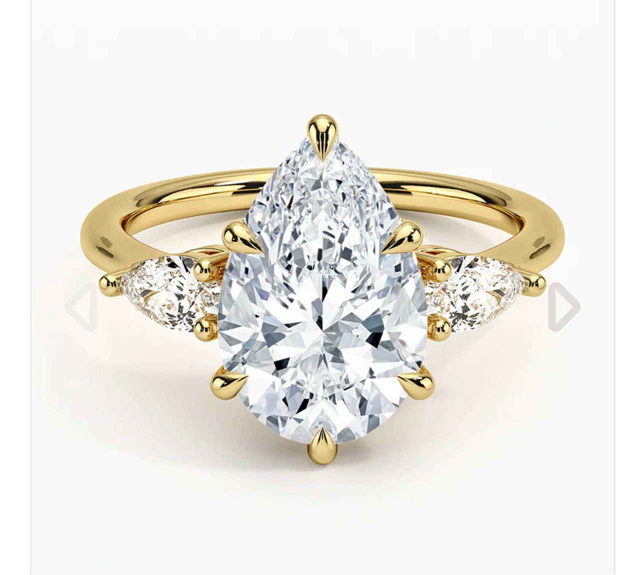 3 carat IGI certified lab diamond VS1 F pear. 0.5ctx2 side stones. Yellow gold 18K
