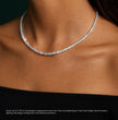 white gold tennis necklace on a woman's neck with a dark background, ecomposer-metal type-white-gold-18k, ecomposer-metal type-yellow-gold-18k, ecomposer-metal type-rose-gold-18k