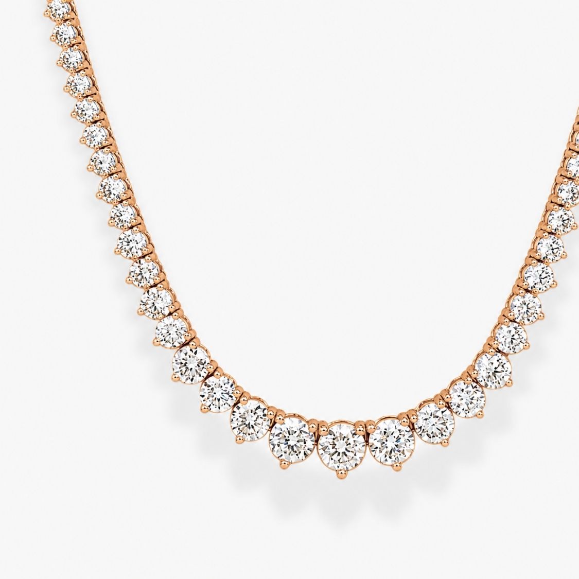 Rose gold necklace with diamonds on a light gray background, ecomposer-metal type-rose-gold-18k