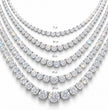 Diamond tennis necklace with varying diamond carat weights on a white background, ecomposer-metal type-white-gold-18k, ecomposer-metal type-yellow-gold-18k, ecomposer-metal type-rose-gold-18k