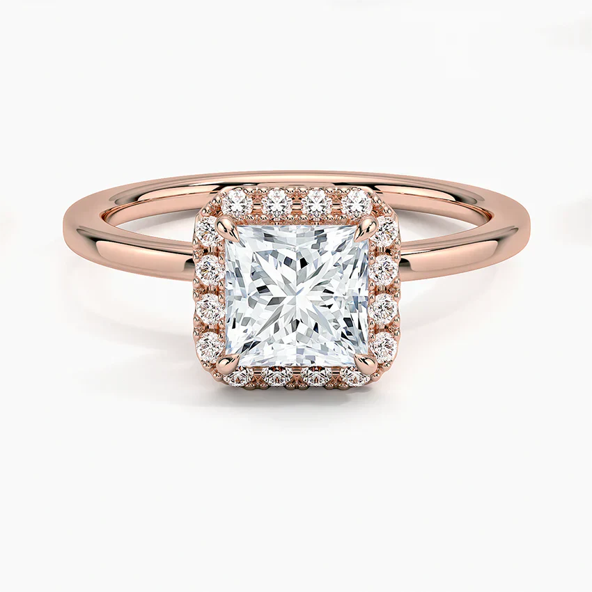 Rose gold halo engagement ring with princess cut center lab-grown diamond and pavé accents