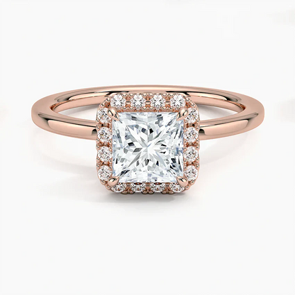 Rose gold halo engagement ring with princess cut center lab-grown diamond and pavé accents