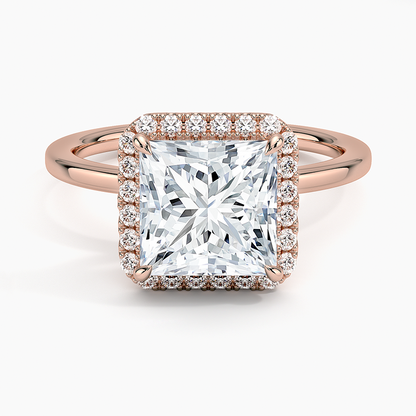Princess cut diamond halo engagement ring with rose gold band and pavé diamonds