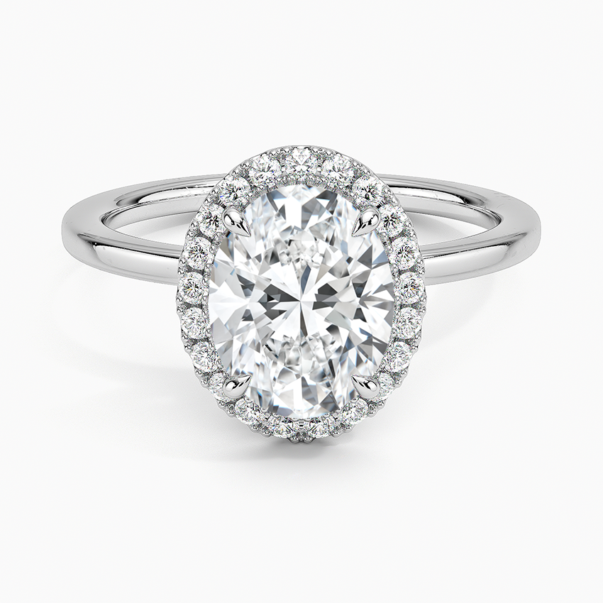 Oval halo platinum engagement ring with lab-grown diamond and pavé band