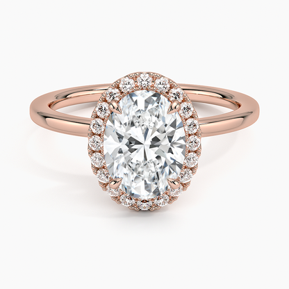 Oval lab-grown diamond halo engagement ring in rose gold with pavé setting
