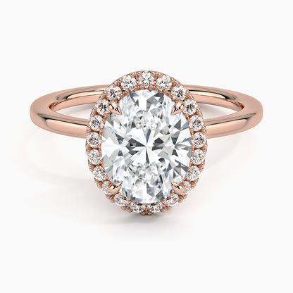 Oval halo engagement ring with rose gold band and pavé lab-grown diamonds