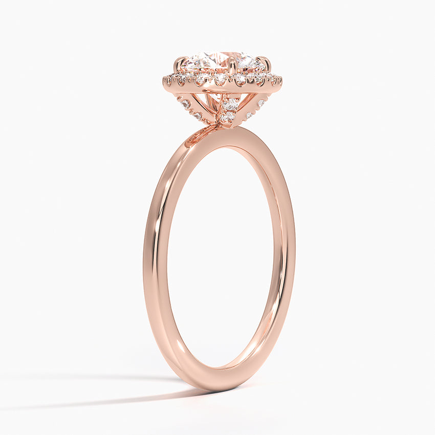 Rose gold engagement ring with round halo lab-grown diamond and pavé setting