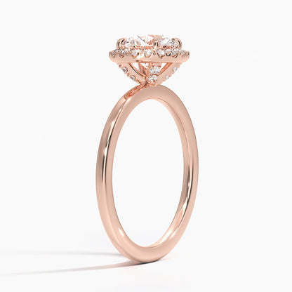 Rose gold engagement ring with round halo lab-grown diamond and pavé setting