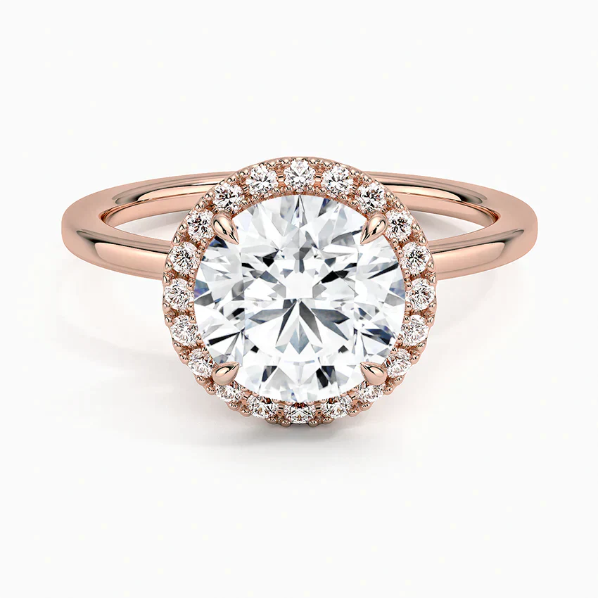 Round halo rose gold engagement ring with large center lab-grown diamond and diamond accents