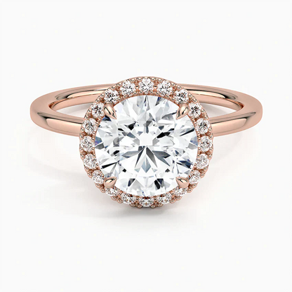 Round halo rose gold engagement ring with large center lab-grown diamond and diamond accents