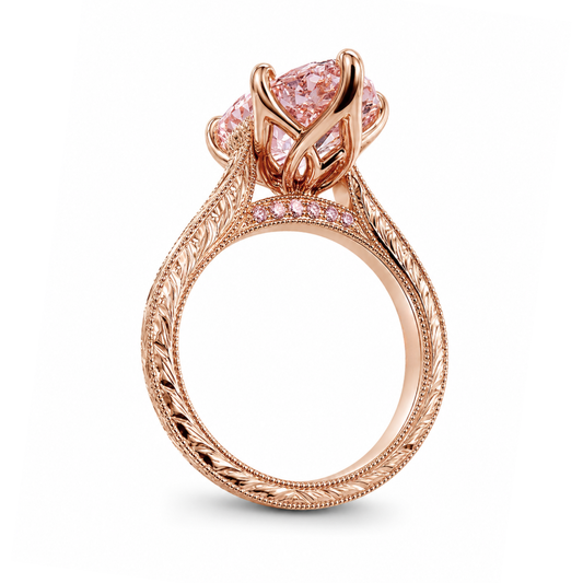 A rose gold engagement ring featuring a large, round pink gemstone in a prong setting, with a decorative filigree band accented by small pink stones, shown on a white background, ecomposer-metal type-rose-gold-18k
