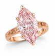 A rose gold ring featuring a large marquise-cut pink diamond center stone, set against a clean white background, ecomposer-metal type-rose-gold-18k