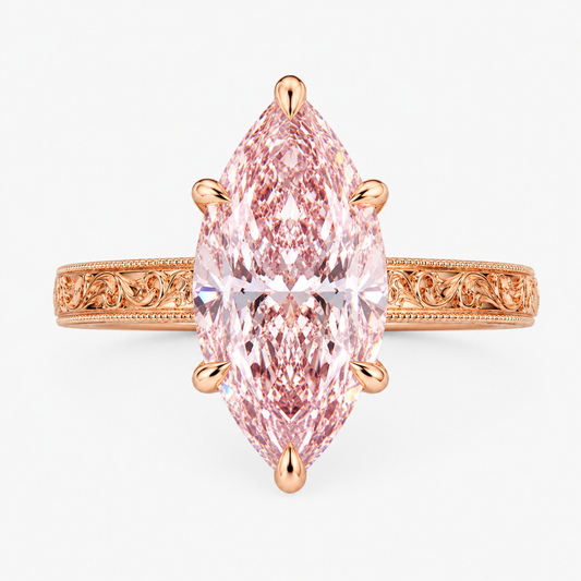 A rose gold vintage engraved band ring featuring a large marquise-cut pink diamond center stone, set against a clean white background, ecomposer-metal type-rose-gold-18k
