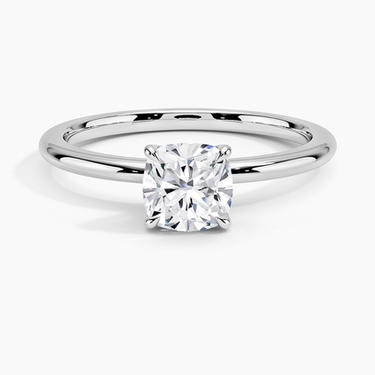 Cushion-cut solitaire lab-grown diamond engagement ring in platinum with four-prong setting