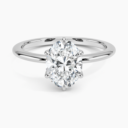 Solitaire oval-cut white diamond engagement ring with sleek gold band