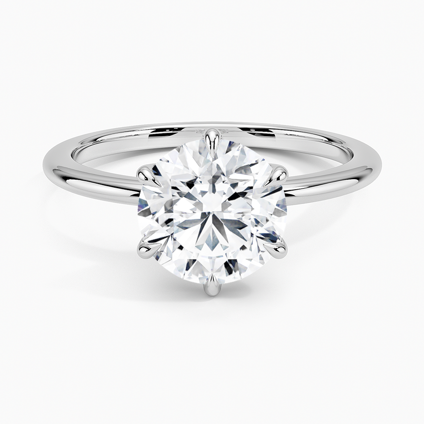Round lab-grown diamond solitaire engagement ring with six-prong white gold setting