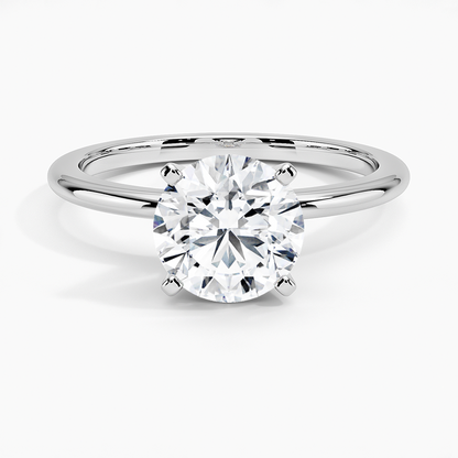 1.5 carat round lab-grown diamond solitaire engagement ring in white gold with 4-prong setting