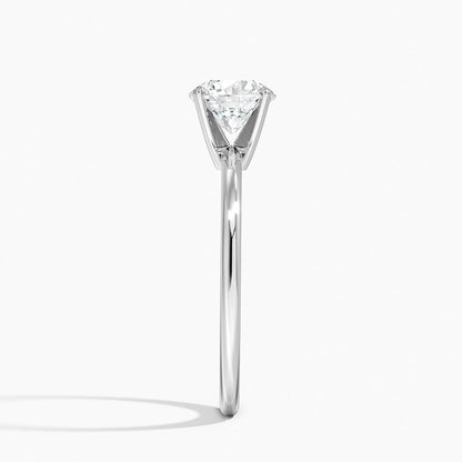 Side view of a solitaire white gold engagement ring with a round lab-grown diamond